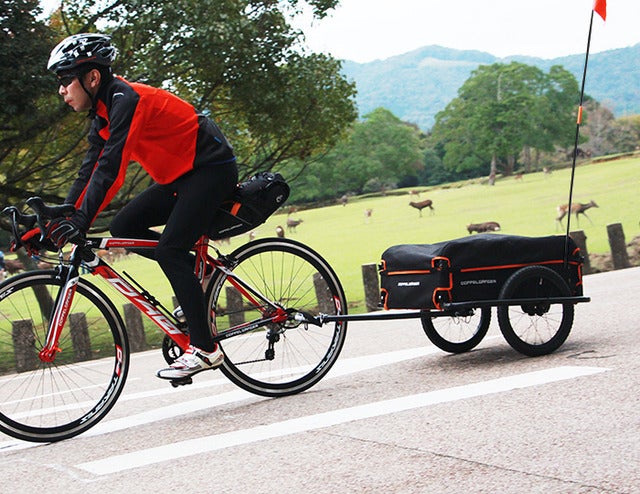 自転車で荷台に載せきれない荷物を運ぶ「サイクルトレーラー」